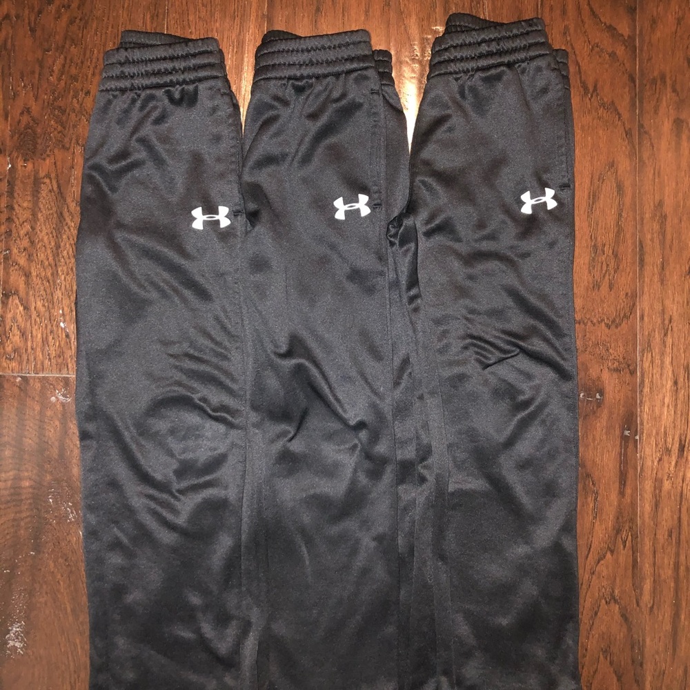 THREE PAIRS of boys size 6 Under Armour pants